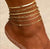 Layered 18K gold anklets stacked on ankle — adjustable gold ankle bracelet set by Twelfth XII