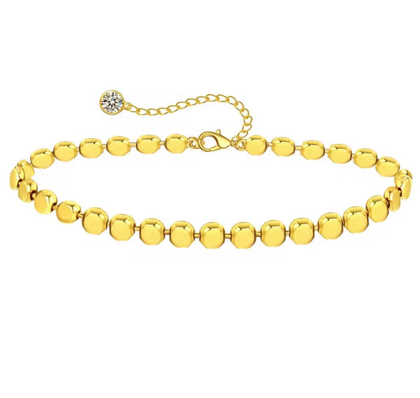 18K gold anklet stack set — 21 layered ankle bracelets including Cuban link, herringbone, tennis, rope, beaded, and leaf chain styles