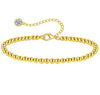 18K gold anklet stack set — 21 layered ankle bracelets including Cuban link, herringbone, tennis, rope, beaded, and leaf chain styles