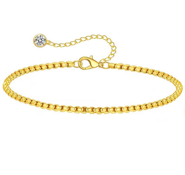 18K gold anklet stack set — 21 layered ankle bracelets including Cuban link, herringbone, tennis, rope, beaded, and leaf chain styles