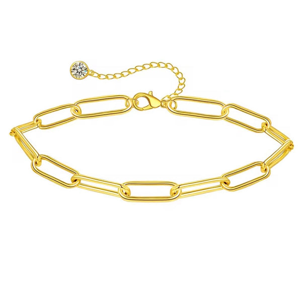 18K gold anklet stack set — 21 layered ankle bracelets including Cuban link, herringbone, tennis, rope, beaded, and leaf chain styles