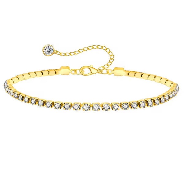 18K gold anklet stack set — 21 layered ankle bracelets including Cuban link, herringbone, tennis, rope, beaded, and leaf chain styles