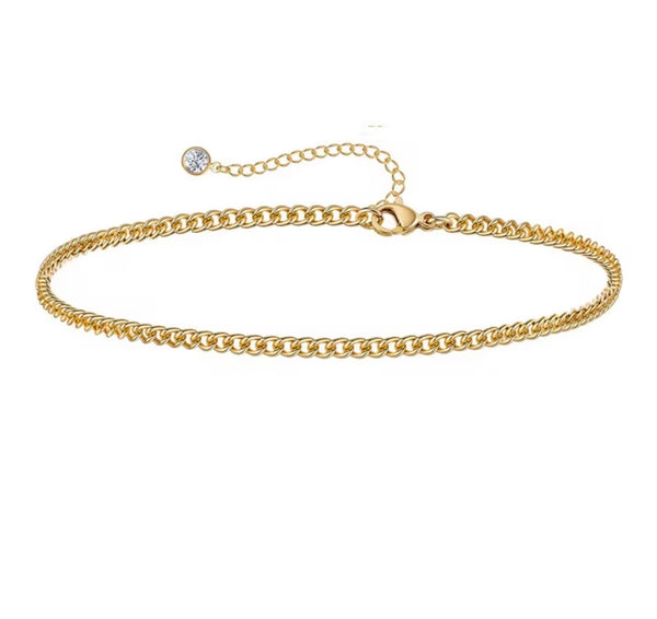 18K gold anklet stack set — 21 layered ankle bracelets including Cuban link, herringbone, tennis, rope, beaded, and leaf chain styles