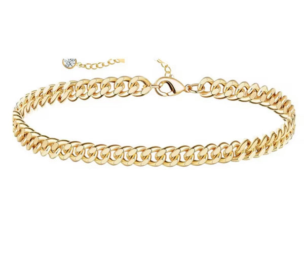 18K gold anklet stack set — 21 layered ankle bracelets including Cuban link, herringbone, tennis, rope, beaded, and leaf chain styles