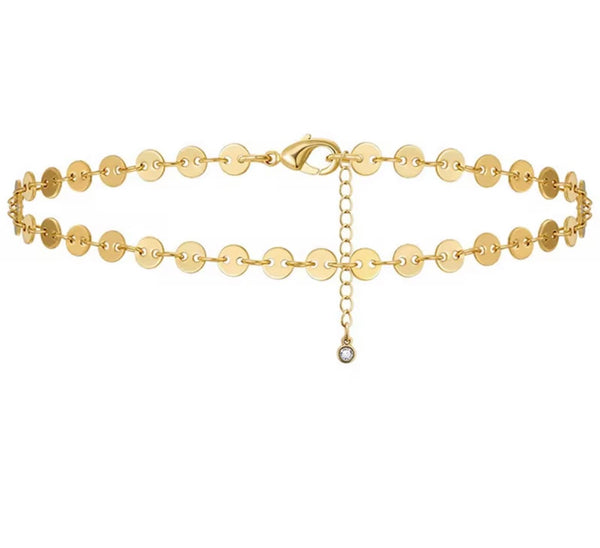 18K gold anklet stack set — 21 layered ankle bracelets including Cuban link, herringbone, tennis, rope, beaded, and leaf chain styles