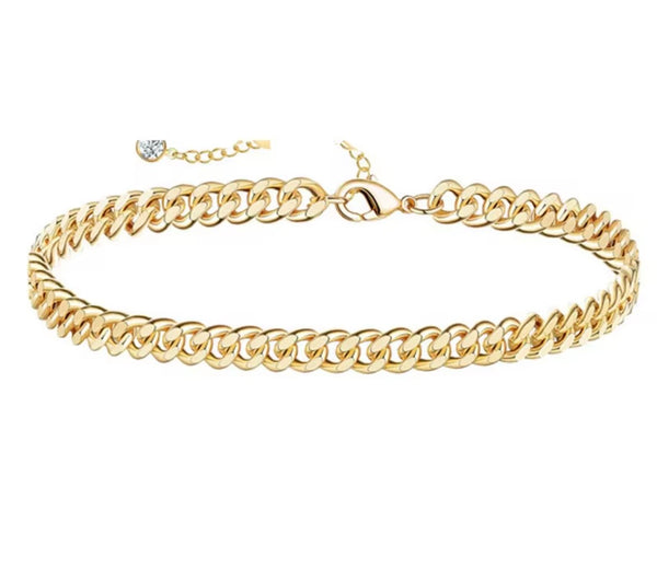 18K gold anklet stack set — 21 layered ankle bracelets including Cuban link, herringbone, tennis, rope, beaded, and leaf chain styles