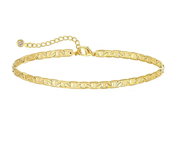 18K gold anklet stack set — 21 layered ankle bracelets including Cuban link, herringbone, tennis, rope, beaded, and leaf chain styles