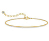 18K gold anklet stack set — 21 layered ankle bracelets including Cuban link, herringbone, tennis, rope, beaded, and leaf chain styles