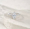 1ct marquise cut moissanite engagement ring in S925 sterling silver double-prong pavé setting on white background — Twelfth XII