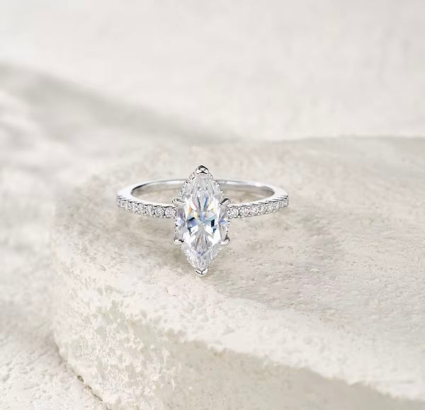 1ct marquise cut moissanite engagement ring in S925 sterling silver double-prong pavé setting on white background — Twelfth XII