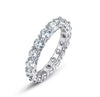 4mm round brilliant moissanite full eternity band in 925 sterling silver shared-prong setting on white background — Twelfth XII wedding band