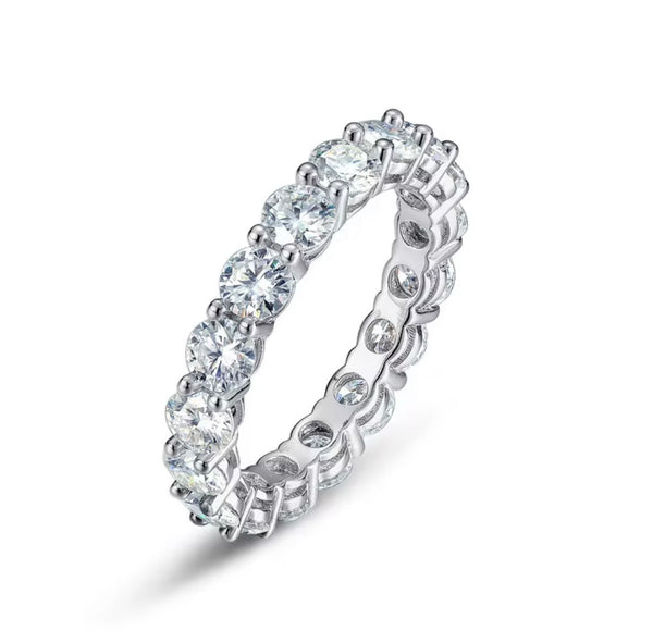 4mm round brilliant moissanite full eternity band in 925 sterling silver shared-prong setting on white background — Twelfth XII wedding band