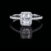 Top-down view of radiant cut moissanite halo ring in S925 sterling silver pavé setting on dark background — Twelfth XII wedding ring