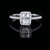 Top-down view of radiant cut moissanite halo ring in S925 sterling silver pavé setting on dark background — Twelfth XII wedding ring