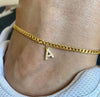 18K gold PVD Cuban link anklet with pavé cubic zirconia initial letter A charm displayed on ankle — personalized gold initial anklet