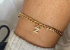 18K gold PVD Cuban link anklet with pavé cubic zirconia initial letter Z charm displayed on ankle — personalized gold initial anklet