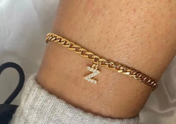 18K gold PVD Cuban link anklet with pavé cubic zirconia initial letter Z charm displayed on ankle — personalized gold initial anklet