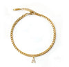 18K gold PVD Cuban link anklet with pavé cubic zirconia initial letter A charm displayed on ankle — personalized gold initial anklet