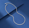 Double Franco chain link detail in solid 925 sterling silver with platinum finish on royal blue background
