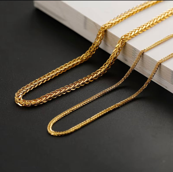Close-up of  18k gold foxtail necklace  showing width comparison