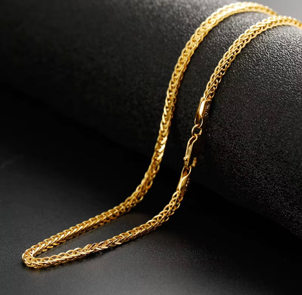 18k gold foxtail necklace laid out showing lobster clasp and 18k stamp detail